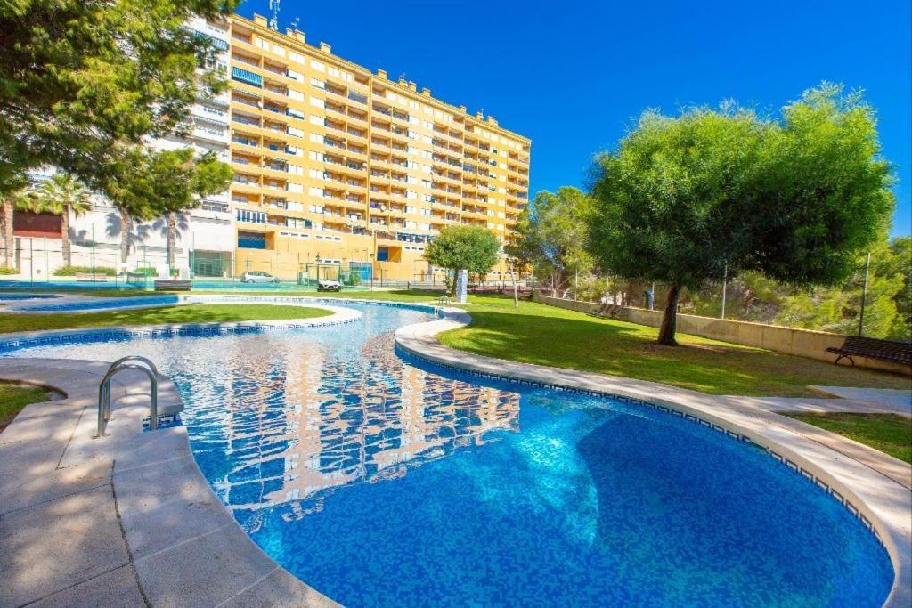 Apartment In Campoamor Overlooking The Swimming Pool Exterior photo