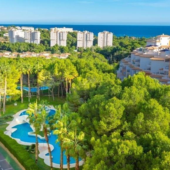 Apartment In Campoamor Overlooking The Swimming Pool Exterior photo