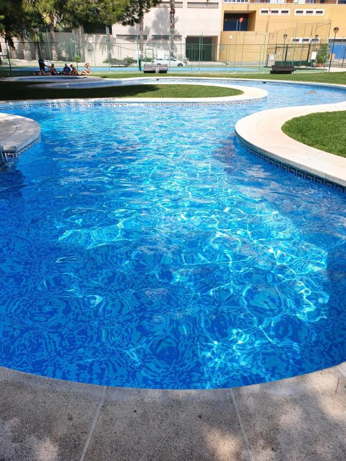 Apartment In Campoamor Overlooking The Swimming Pool Exterior photo