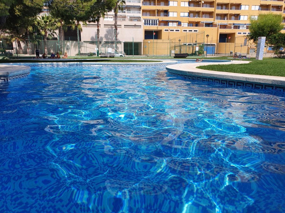 Apartment In Campoamor Overlooking The Swimming Pool Exterior photo
