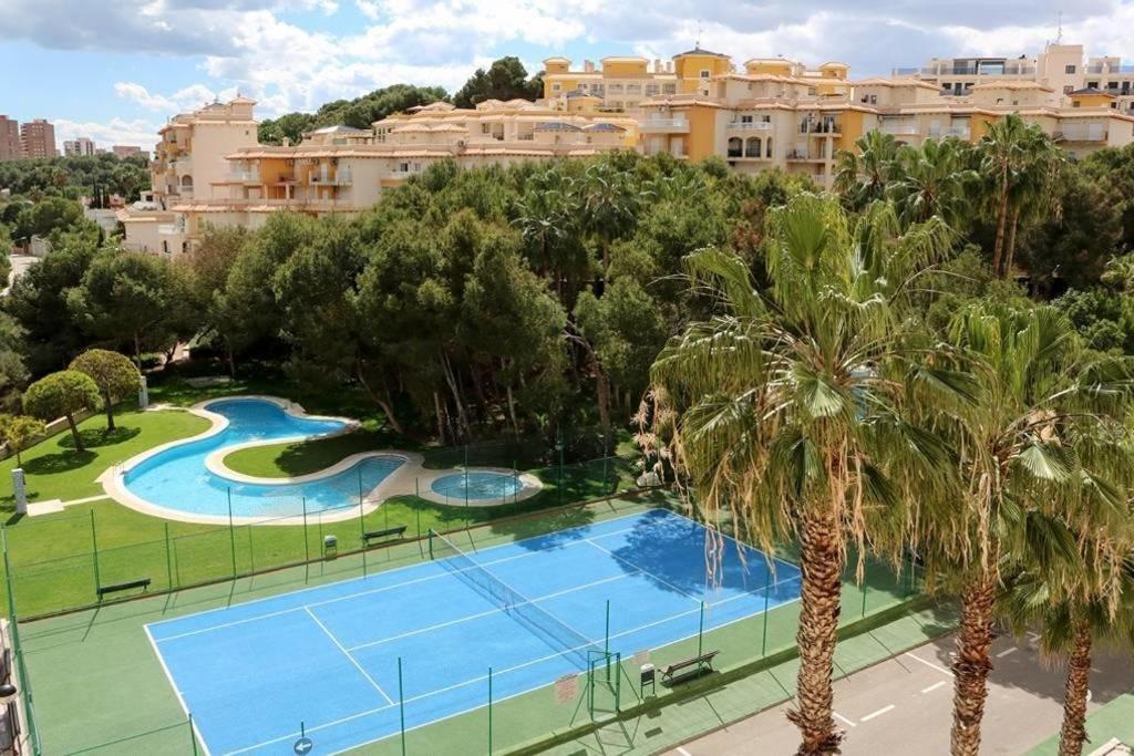 Apartment In Campoamor Overlooking The Swimming Pool Exterior photo