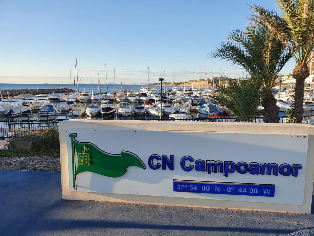 Apartment In Campoamor Overlooking The Swimming Pool Exterior photo