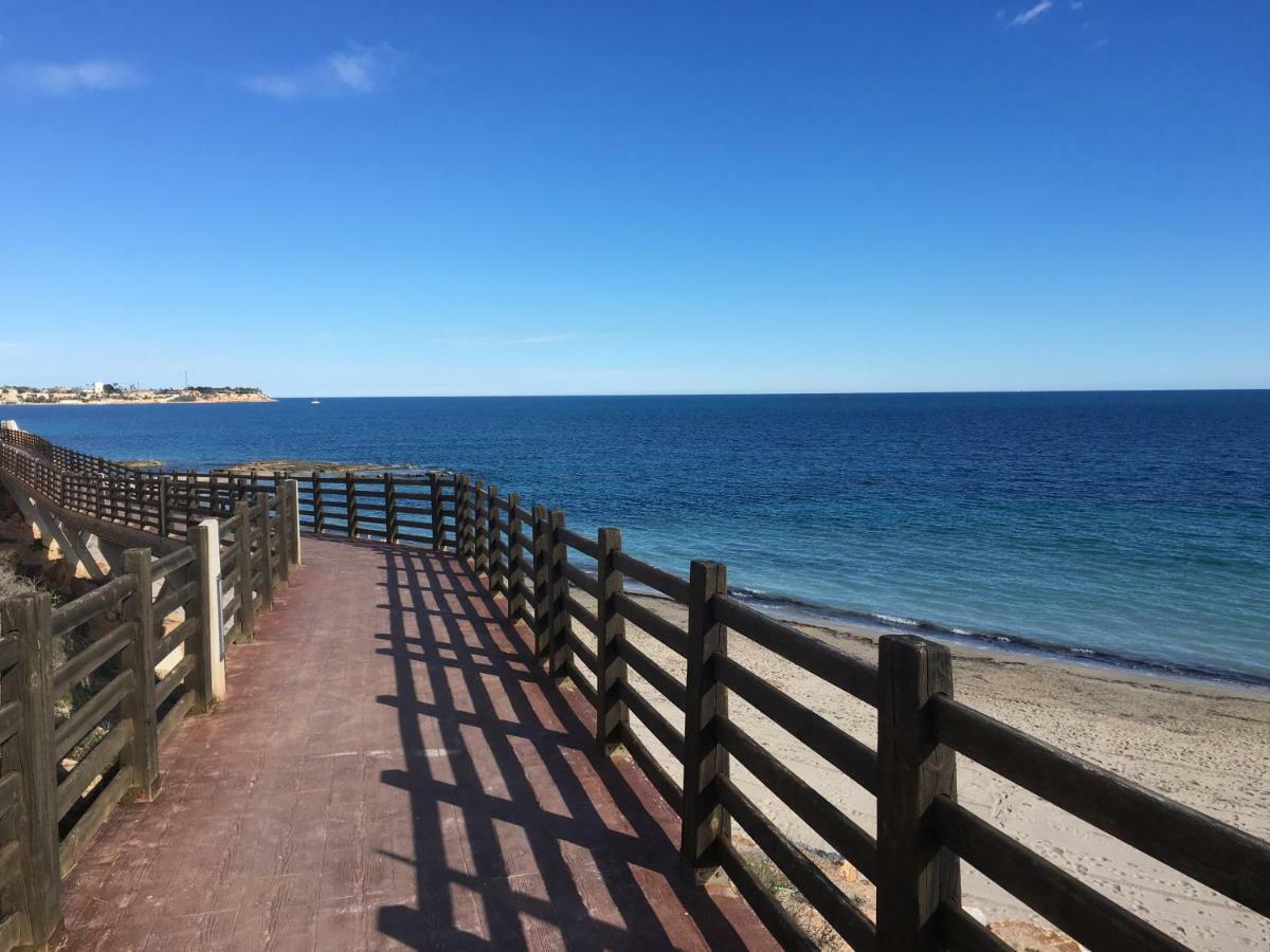 Apartment In Campoamor Overlooking The Swimming Pool Exterior photo