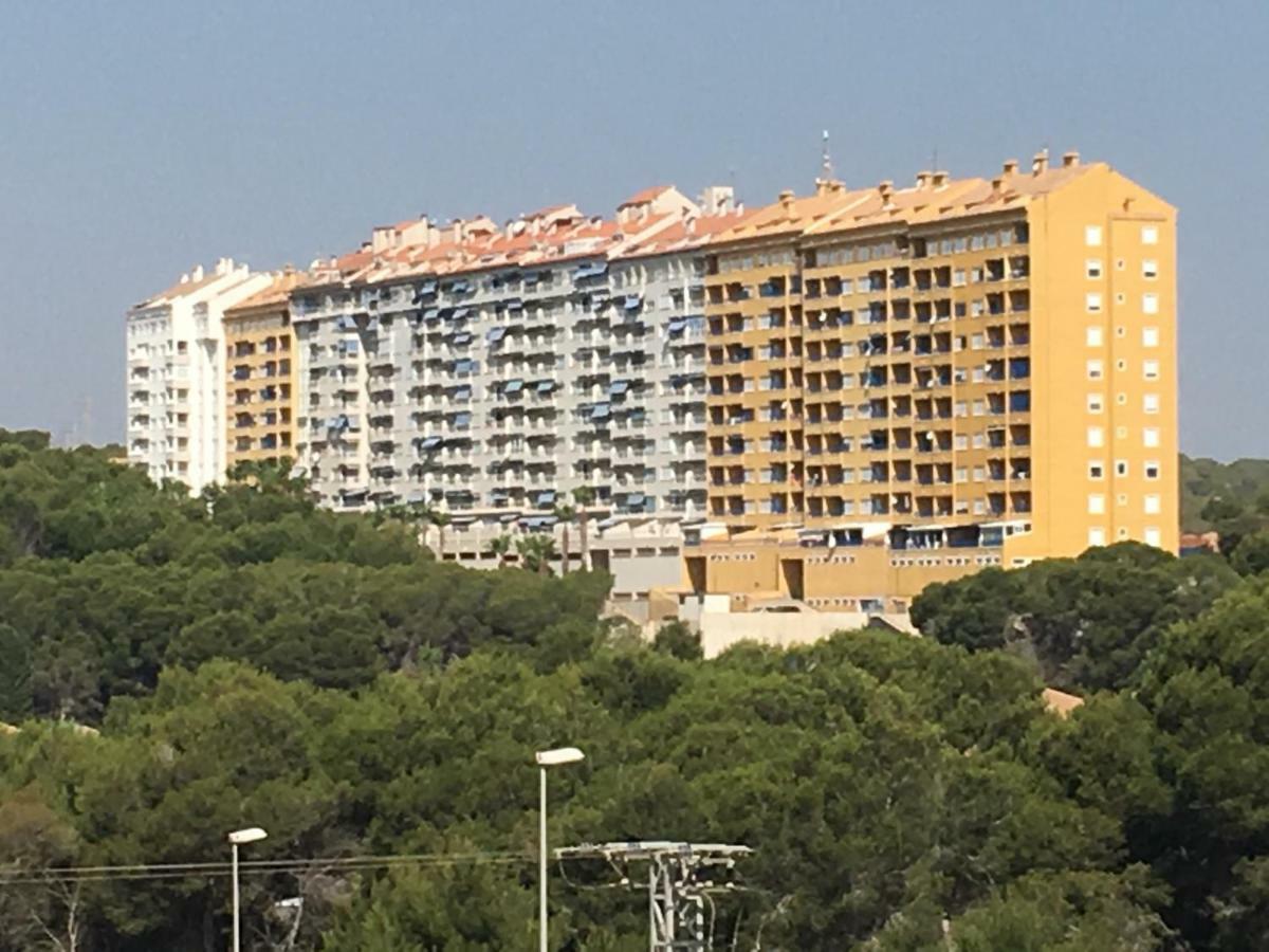 Apartment In Campoamor Overlooking The Swimming Pool Exterior photo