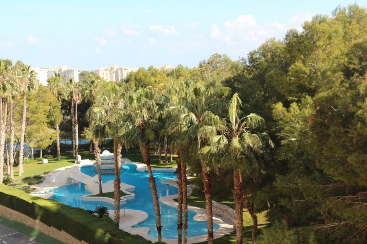 Apartment In Campoamor Overlooking The Swimming Pool Exterior photo